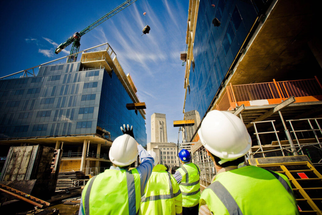 construction workers are looking at the working site 49v75johxbis5hbe
